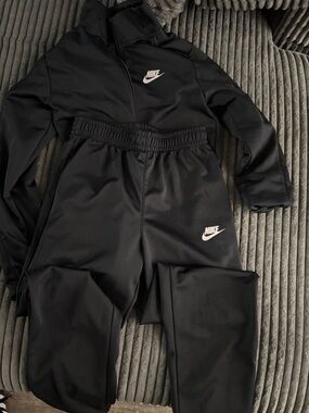 Nike Black Kids Track Pants with White Swoosh